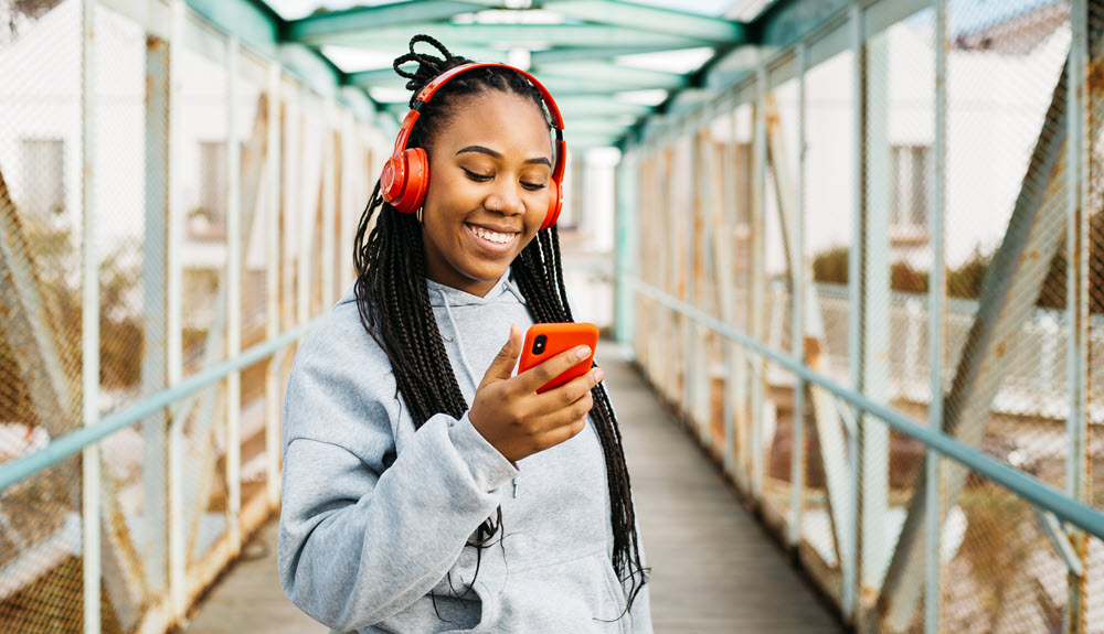 Woman looking at mobile banking app.