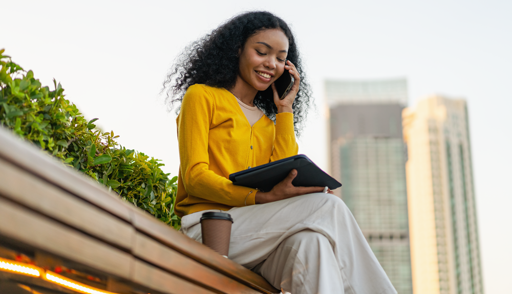 Woman looking at phone in Downtown Atlanta.