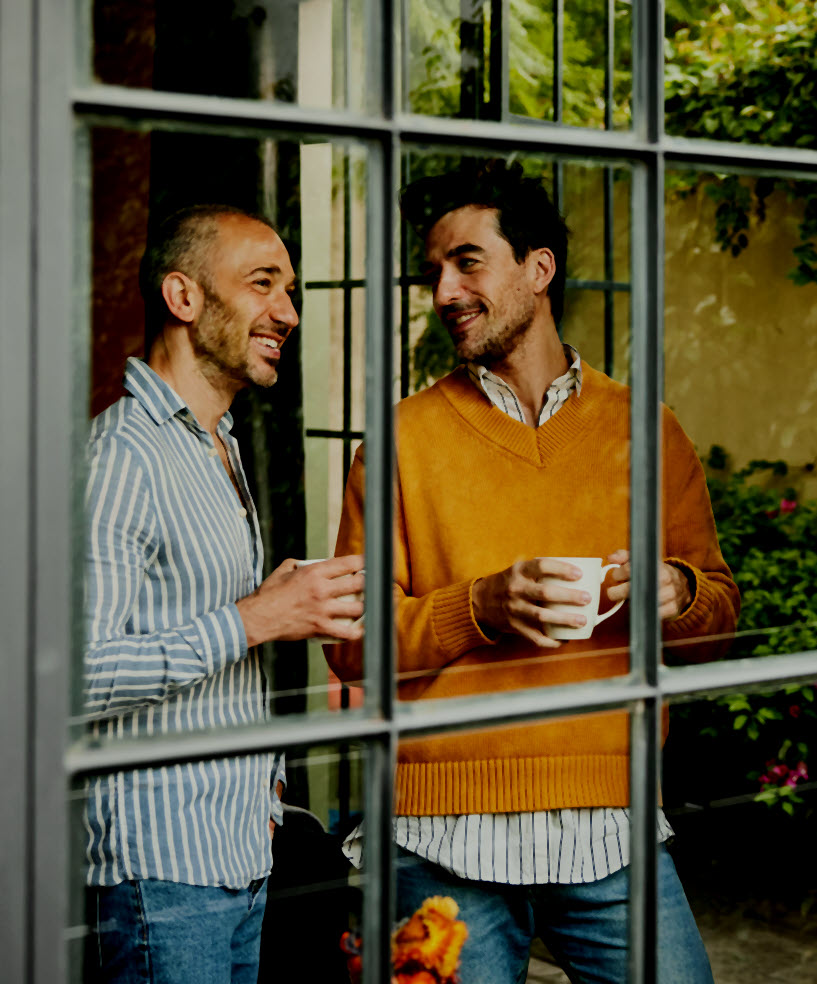 Man speaking with his financial planner.