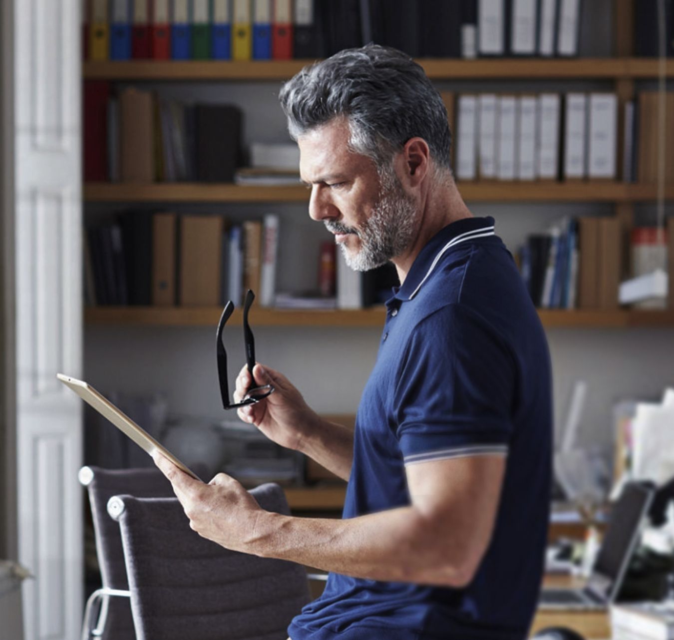 Man reading on tablet